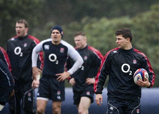 England&#039;s Ben Youngs (R) attends training session in Bagshot, south-east England, on March 8, 2013