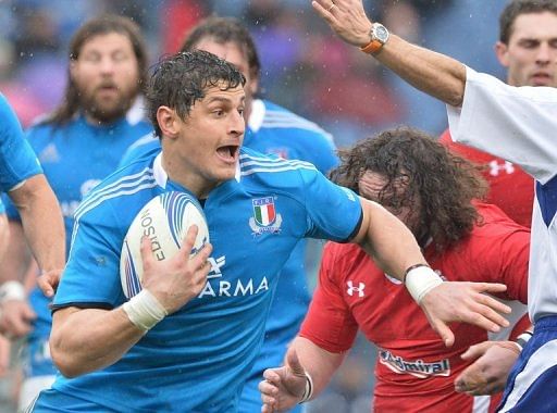 Italy&#039;s Edoardo Gori runs with ball during their Six Nations match against Wales, in Rome, on February 23, 2013