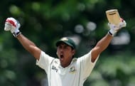 Bangladeshâs Mohammad Ashraful raises his bat in celebration after scoring a century against Sri Lanka in Galle on March 10, 2013. Ashraful and Mushfiqur Rahim smashed impressive centuries in a record stand as Bangladesh dominated the third day.