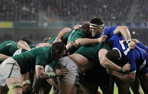 France&#039;s Guilhem Guirado grimaces during a scrum during their match against Ireland in Dublin on March 9, 2013