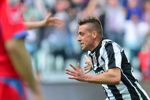 Juventus&#039; Emanuele Giaccherini celebrates after scoring in Turin on March 10, 2013