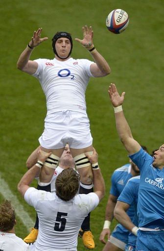 England&#039;s no 8 Tom Wood is hoist up to claim the ball at Twickenham on March 10, 2013
