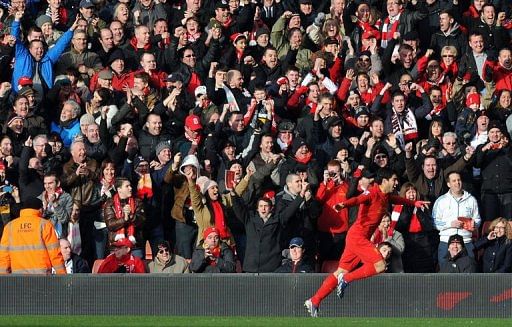 Liverpool&#039;s Luis Suarez celebrates scoring in Liverpool on March 10, 2013