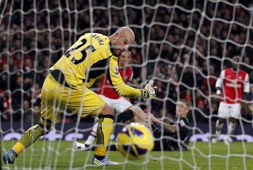 Liverpool goalkeeper Pepe Reina (L) is pictured during a Premier League match against Arsenal on January 30, 2013
