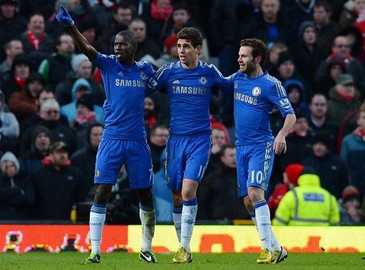 Chelsea&#039;s Ramires (L) celebrates with teammates Oscar (C) and Juan Mata during their match on March 10, 2013