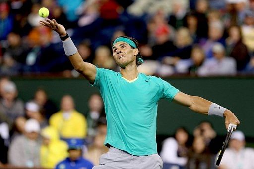 Rafael Nadal serves during the BNP Paribas Open at the Indian Wells Tennis Garden on March 9, 2013 in Indian Wells