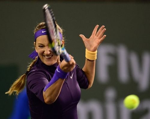 Victoria Azarenka hits a forehand return to Kirsten Flipkens at Indian Wells on March 11, 2013