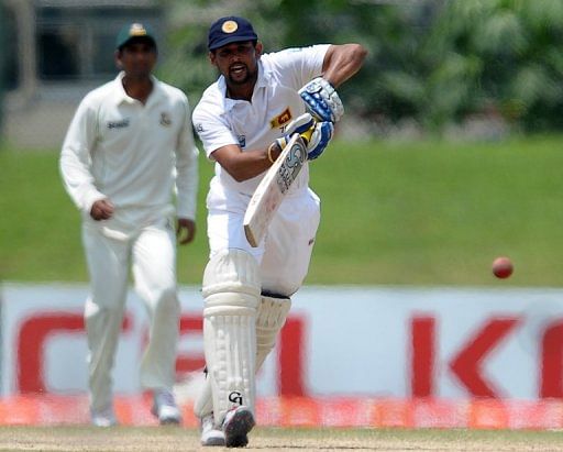 Tillakaratne Dilshan plays a shot during the final day of the opening Test against Bangladesh on March 12, 2013