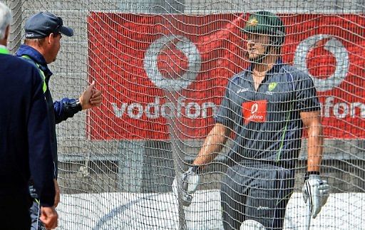 Mickey Arthur (2nd L) makes a point to vice-captain Shane Watson during a net session in Melbourne on December 25, 2012