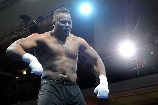 Dereck Chisora poses during a public training in Munich on February 15, 2012