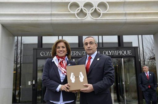 Members of the delegation of Madrid bid Ana Botella and Alejandro Blanco, IOC member pose in Lausanne on January 7, 2013