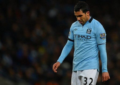 Manchester City&#039;s Carlos Tevez reacts at the Etihad Stadium in Manchester, on March 9, 2013