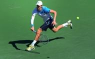 Kevin Anderson hits a forehand return against Gilles Simon in Indian Wells, California on March 13, 2013