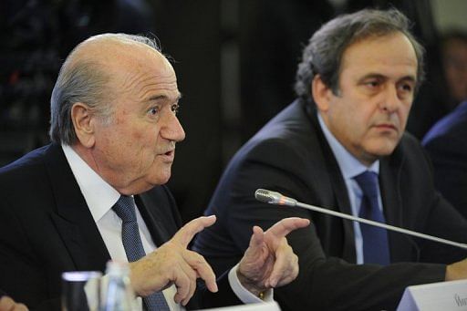 Sepp Blatter (left) and European counterpart Michel Platini in St Petersburg on January 19, 2012