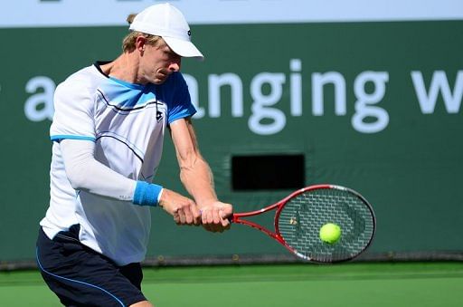 Thomas Berdych of the Czech Republic hits a backhand return against Kevin Anderson of South Africa on March 14, 2013