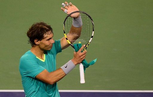 Rafael Nadal  acknowledges the crowd after defeating Roger Federer on March 14, 2013 in the BNP Paribas Open