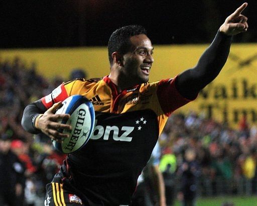 Lelia Masaga (L) of the Waikato Chiefs celebrates as he scores a try in Hamilton on August 4, 2012