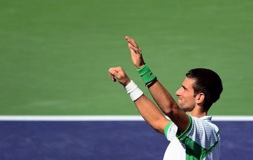 Novak Djokovic celebrates his victory over Jo-Wilfried Tsonga, in Indian Wells, California, on March 15, 2013