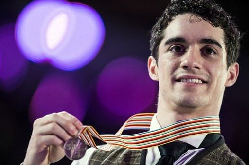 Javier Fernandez celebrates with his Bronze medal, in London, Ontario, on March 15, 2013