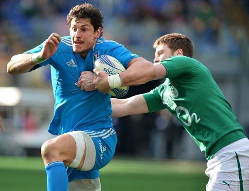 Italy&#039;s flanker Alessandro Zanni is tackled by Ireland&#039;s lock Iain Henderson (R) in Rome on March 16, 2013