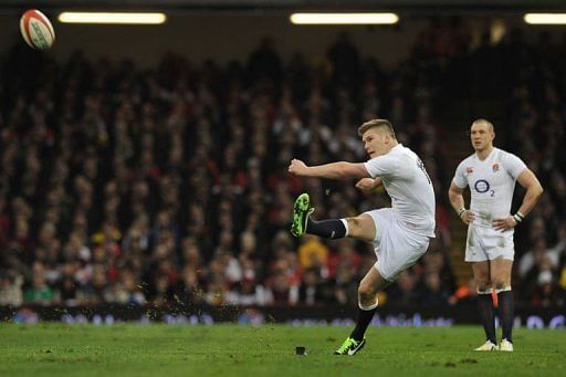 England&#039;s fly half Owen Farrell kicks a penalty in Cardiff on March 16, 2013