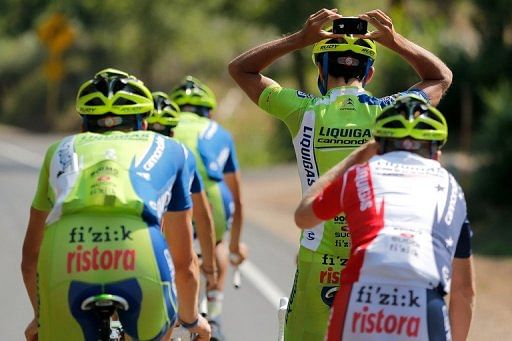Moreno Moser of Italy takes a photo behind his head of a teammate on August 19, 2012 in Durango, Colorado