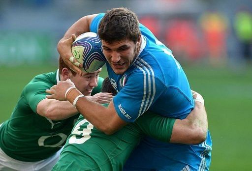 Italy winger Giovanbattista Venditti (R) is pictured during their Six Nations match against Ireland on March 16, 2013