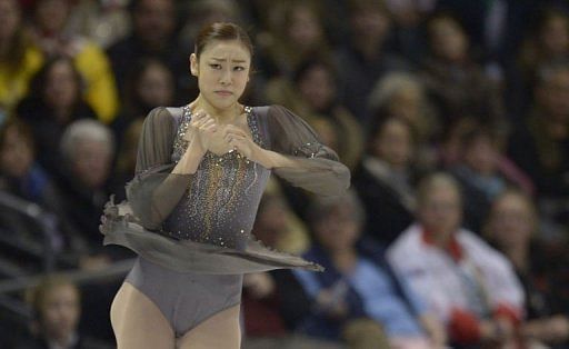 Kim Yu-Na performs during the women&#039;s free skating event at the World Figure Skating Championships on March 16, 2013