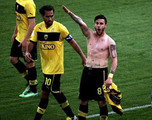 This picture taken on March 16, 2013 shows Giorgos Katidis celebrating a goal with a Nazi salute in Athens