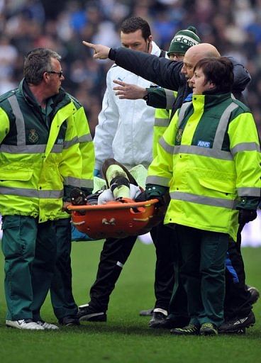 Massadio Haidara is stretchered off the pitch in Wigan on March 17, 2013 Massadio Haidara is stretchered off the pitch in Wigan on March 17, 2013