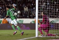 Saint-Etienne's Brandao (L) reacts next to Paris keeper Salvatore Sirigu after Alex scored an own-goal on March 17, 2013