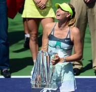 Maria Sharapova holds her trophy on March 17, 2013