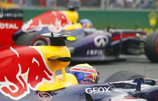 The Red Bulls of Mark Webber (front) and Sebastian Vettel on the grid before the Australian Grand Prix on March 17, 2013