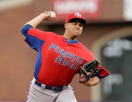 Mario Santiago of Puerto Rico pitches during their WBC semi-final against Japan on March 17, 2013