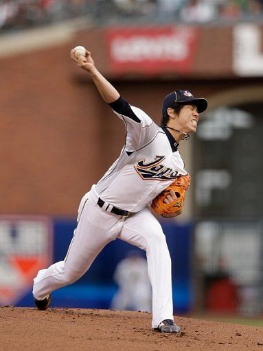 Kenta Maeda of Japan pithes during their WBC semi-final against Puerto Rico on March 17, 2013