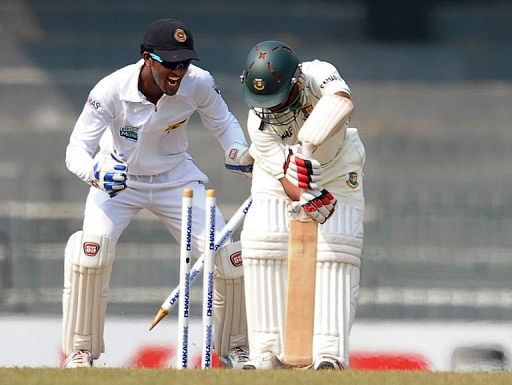 Bangladesh&#039;s Mohammad Ashraful (right) is dismissed by Sri Lanka&#039;s Rangana Herath (unseen) in Colombo, on March 18, 2013