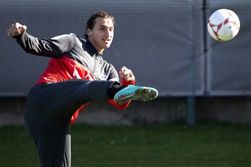 Paris Saint Germain&#039;s Zlatan Ibrahimovic practices during a training session at the Camp des Loges, on October 5, 2012