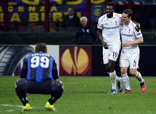 Tottenham Hotspur&#039;s Emmanuel Adebayor (C) celebrates after scoring during on March 14, 2013 at the San Siro