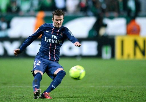 David Beckham kicks the ball on March 17, 2013 at the Geoffroy Guichard stadium in Saint-Etienne