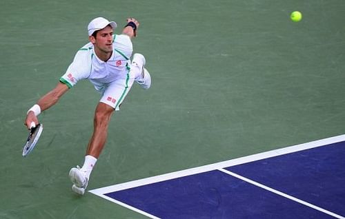 Novak Djokovic hits a forehand return during his defeat to Juan Martin del Potro on March 16, 2013 at Indian Wells