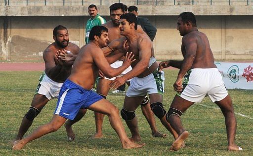 An Indian player competes against Pakistan in Kabaddi on November 1, 2012