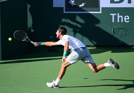 Juan Martin del Potro hits a return to Rafael Nadal of Spain on March 17, 2013 in Indian Wells