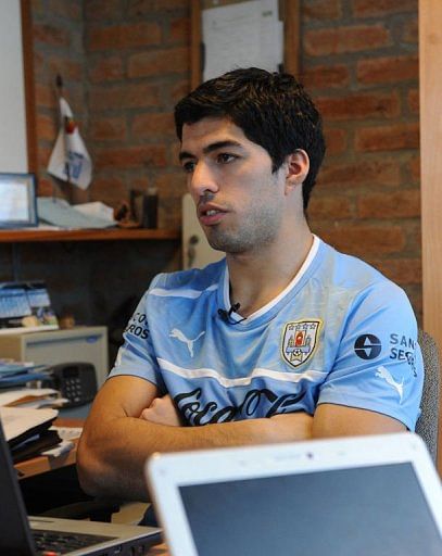 Luis Suarez gives an interview with AFP on March 19, 2013, in Montevideo