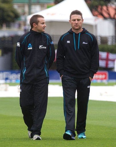 New Zealand head coach Mike Hesson (L) and captain Brendon McCullum in Wellington on March 18, 2013