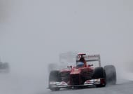 Ferrari driver Fernando Alonso battled the elements to win the Malaysian Grand Prix on March 25, 2012