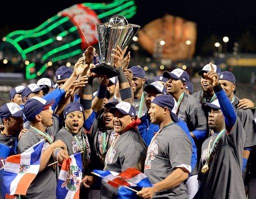 Dominican Republic celebrate winning the World Baseball Classic after beating Puerto Rico 3-0 on March 19, 2013