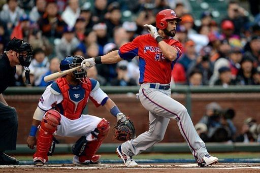 Angel Pagan of Puerto Rico hits a single at the World Baseball Classic on March 19, 2013 in San Francisco