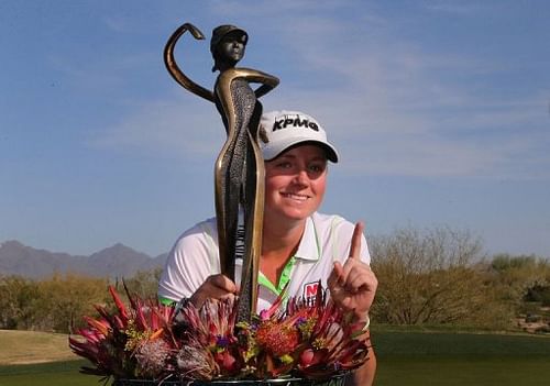 Stacy Lewis poses with the trophy after winning the the RR Donnelley LPGA Founders Cup on March 17, 2013 in Phoenix