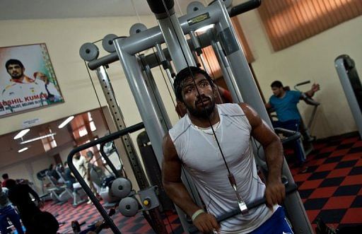 Indian wrestler and London Olympics bronze-medal winner Yogeshwar Dutt works out on March 5, 2013