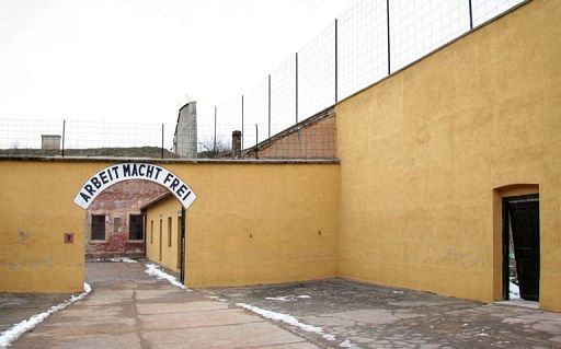 This file photo shows the entrance to the fortress in the Czech city of Terezin with the Nazi phrase: 
